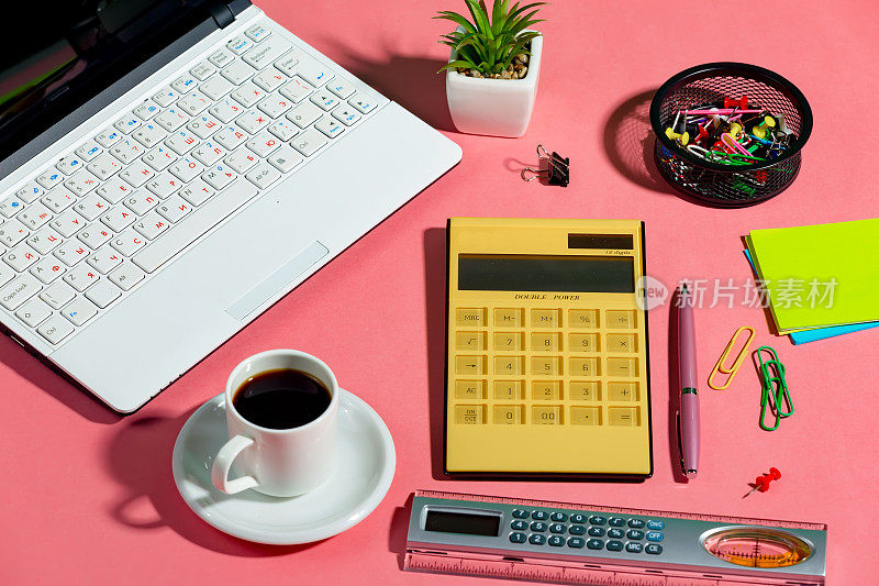 Items for business and accounting on a bright, colored background.
